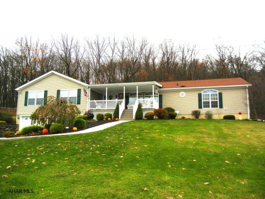 Amazingly stunning describes this one story home that offers over 2400 sq. foot. No detail overlooked. Very spacious kitchen w/eating area & french doors that lead to a large deck. Large & relaxing family room w/stone FP & bar to entertain guests. Formal dining room is bright w/large arched window. Extra wide hallways. 4th BR & 3/4 bath in basement. A car buff's dream with 4 car garage or workshop. Property lines--- seller states that it goes approx 15 feet into the woods behind the house.  In front of the house you will see a fence---that belongs to the neighbor, but the shrubs belong to the seller......Immaculate condition. Truly a Must See.