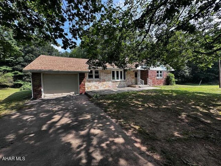 Hi Ho, Hi Ho it's off to home we go....who else can say that they live in the former home of an American country music singer, guitarist, songwriter and author.....from my understanding although it is not in print...he was quite the character. Having had this home built in the mountains for he and his bride at the time, he even had the fireplace designed  to hold his gold album award. Here is hat I found out about this...

Elton Britt was the first country artist to receive a gold disc award for his 1942 hit song, ''There's a Star-Spangled Banner Waving Somewhere''. The patriotic ballad sold over a million copies by 1944 and was the first gold record in country music history. 

I realize that we are not selling Elton Britt's music but we are selling the home of some nostalgic memories and ornery shenanigans. 

This beautiful property has both well preserved woodland and lovely fields. The convenience of this property is excellent for anyone commuting to and from the city, yet wanting the country lifestyle and a cozy porch to kick their feet up in the evening.....with the Allegheny Mountains surrounding this location you will never want for beautiful views in every season and abundant wildlife to keep you company.