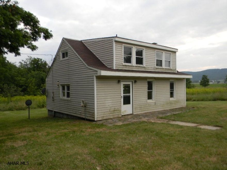 Vinyl clad Cape Cod with 2BR/1BA, handsome brick wood-burning fireplace, in peaceful country setting on large 2.64 acre lot with mountain view. Immediately Available! This is a Fannie Mae HomePath property and is approved for Home Path renovation mortgage financing. Check HomePath.com Special Offers for more details or ask me. Eligibility restrictions apply.