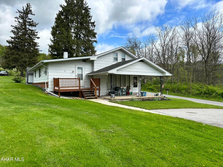 Great opportunity to invest in this 1.5 story home sitting on appox .5 acre in the Hollidaysburg School District. Currently this home is set up as a 3 bedroom 2 bath home with a small 1 bedroom 1 bath studio type apartment. This home could be 4 bed 3 bath making the apartment a primary suite or leaving it as an in-law suite. The 3rd bedroom on the lower level could also be a home office.