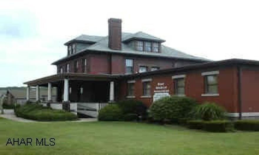 Main building also includes 2 bedroom apartment. Sale price also includes detached office building in rear.  Certain parties excluded.