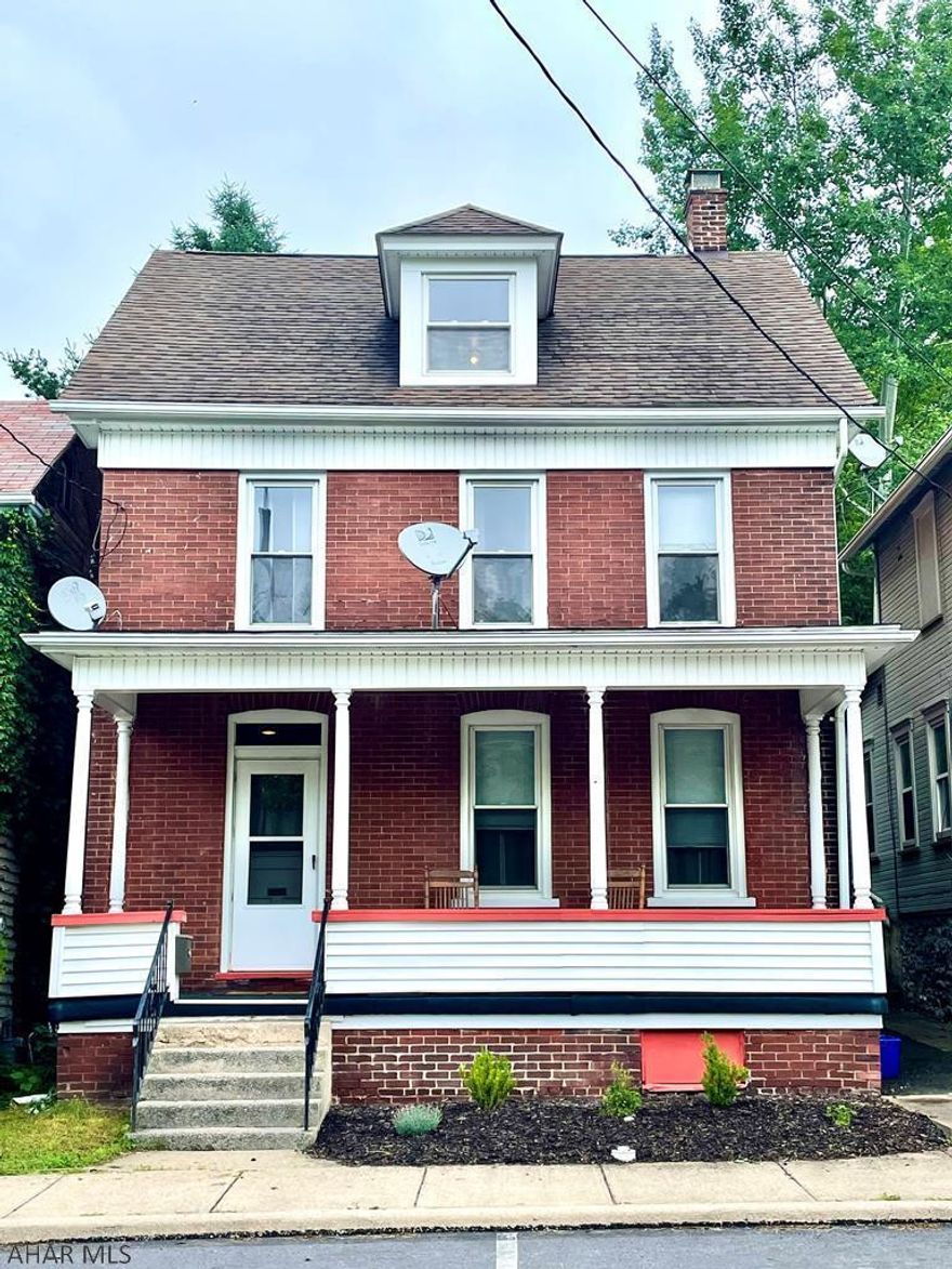 Spacious home in prime location - Hollidaysburg School District!! 3 bedroom, 1.5 bath home offering original hardwood flooring throughout. The 1st floor features a large entryway, living room, dining room, kitchen and half bath. The 2nd floor of the home features a full bath with new vanity and toilet, 2 bedrooms, a master bedroom with captive office/nursery, & partially finished walk up attic space with pool table included! Enter the private outdoor patio/deck from the kitchen with plenty of space for entertaining guests or relaxing with family. Beyond the newly fenced backyard is extra yard space & area for two more off street parking spots off the alleyway. There is also off street parking in front of the house & a nice front porch for relaxing. Come check out this gem in Hollidaysburg!