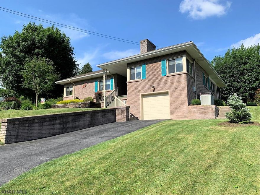 Impressive, quality built ranch home in Orchard Heights!!! Living room w/ fireplace & crown molding; kitchen; dining room; 2-beds; laundry room (could be a 3rd bedroom on main level); half bath, and a full bath. Huge walk-up attic with a floor that could be finished into additional living space, office or a studio. Full basement with a rec room, bedroom, and workshop area. Newer sun porch on the rear of the home, covered front porch, replacement windows, architectural shingle roof, updated oil hot water furnace and central air. One-car integral garage, side and rear driveway for easy accessibility and additional parking. Nicely landscaped, double lot (2-separate deeds!) and peaceful views overlooking Bedford. Home Warranty!!!