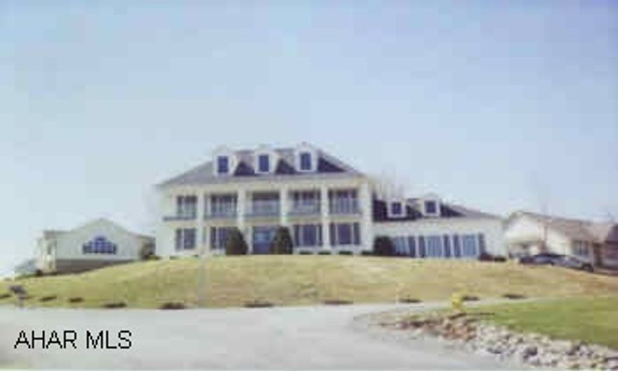 Large picturesque colonial on large corner lot, 6 bedrooms, good condition, 2 furnaces, many amenities, tenant occ.