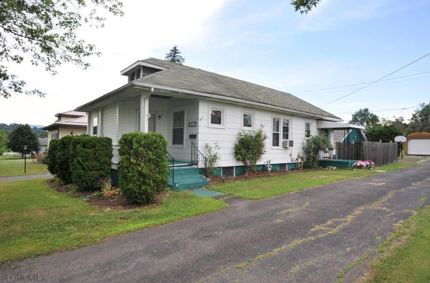 Garden Heights area!! This home features a HUGE level double lot with a private driveway with plenty of off street parking AND a 2 car garage!!!!  With your finishing touches, you could make this home your own! Would make a great starter home!!  Close to the ballpark and I99 for easy access! Quiet neighborhood! Loads of potential!!! Schedule a showing today!  ( Buyer to confirm taxes, sq footage and lot size)  MOTIVATED SELLERS!!!!