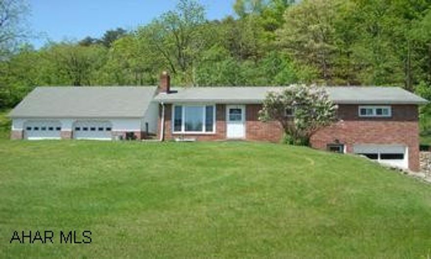 Custom 3 bedroom brick ranch on just over 5 acres in Everett school district. Lovely hardwood floors in bedrooms, finished basment with large stone fireplace with central air/heat pump. Large 2 story garage adds plenty of space for storage, parking, or workshop.  Additional 4 acre parcell to be sold with home totaling 5.28 acres