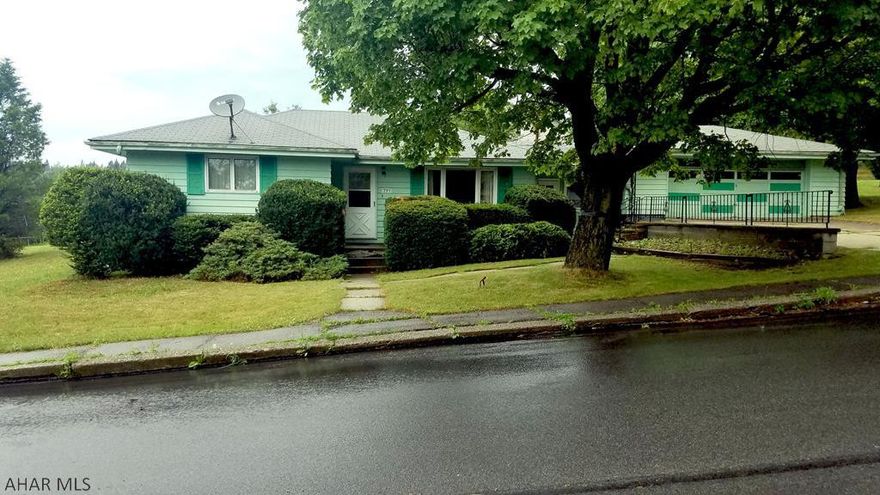 Single story living in Gallitzin.  This ranch home sits on a corner lot in the heart of Gallitzin.  Eat-in kitchen, living room, 3 bedrooms all on first floor.  Also has huge basement that can be made into extra living space.  Walk-out basement to a breezeway that connects to a detached 2 car garage.  Home in need of TLC.  Being sold as-is.