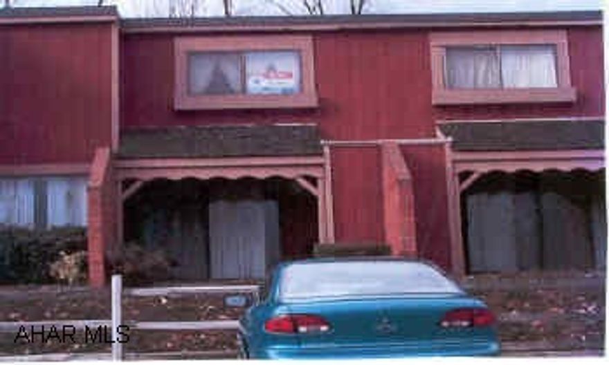 Two story townhouse. Owner must sell--has moved.  This is a nice unit.  It would make a good investment property.  Located across from Mount Aloysius.  There is $110.00 a month association fee that includes water, sewer, trash, and outside maintenance.