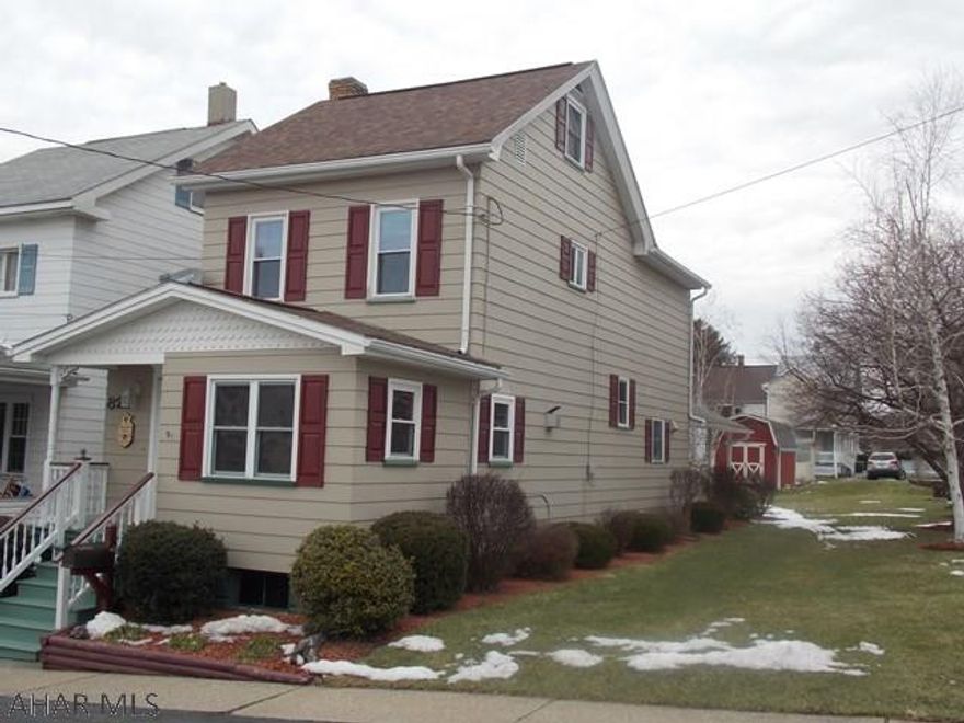 Adorable home beautifully updated eat in kitchen with Corian counters and ceramic floors, large living room  with gas fireplace and dining room with hardwood floors. Upstairs is a lovely new bath and two bedrooms. The third bedroom is on the third floor plus a very large storage area. With nice weather coming the large covered patio will be a great place for a picnic or sit around the fire ring and roast hotdogs. Off street parking in the front of the house and in the back. Nothing left to do but move in.