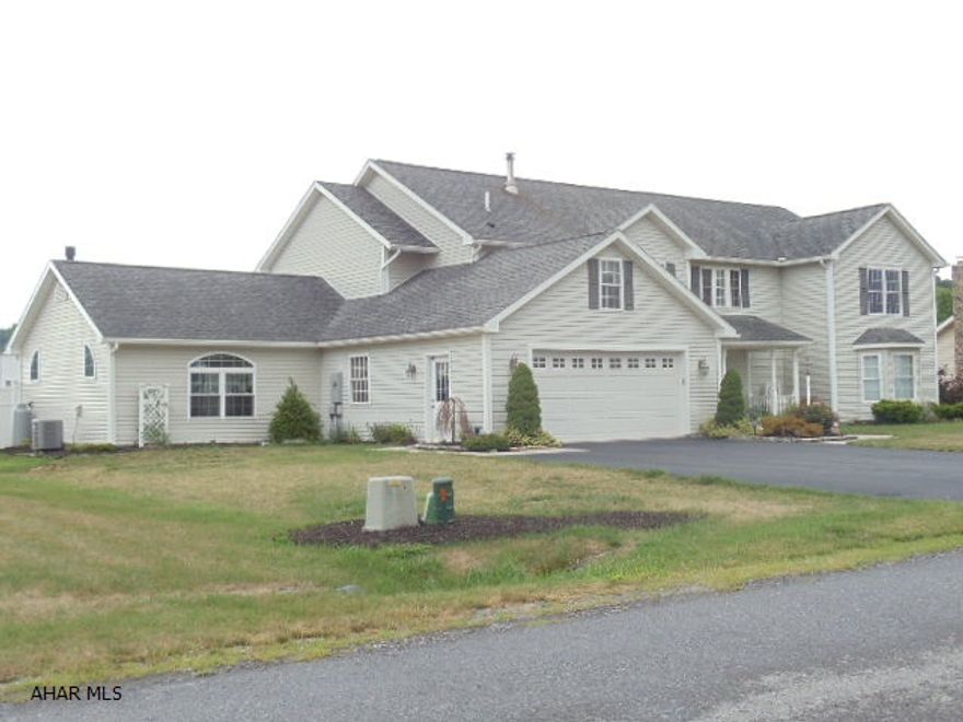 This Fabulous 5-bedroom, 3 1/2-bath home, Features 1st floor master bedroom suite, great room w/vaulted ceilings & fireplace, inground heated pool, pool house w/fireplace, blacktop drive, & attached 2-car garage, Approx 4359 sq ft, Electric heat pump w/central air + oil backup.  Dec 2007 2-story Addition, Dec 2010 Great Room Addition.  #J-083