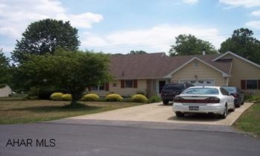 3-4 bedroom, new furnace, A/C, bath, kitchen, family room addition, loads of storage, large deck and lot. Beautiful country setting on quiet street, trout stream at back of property.