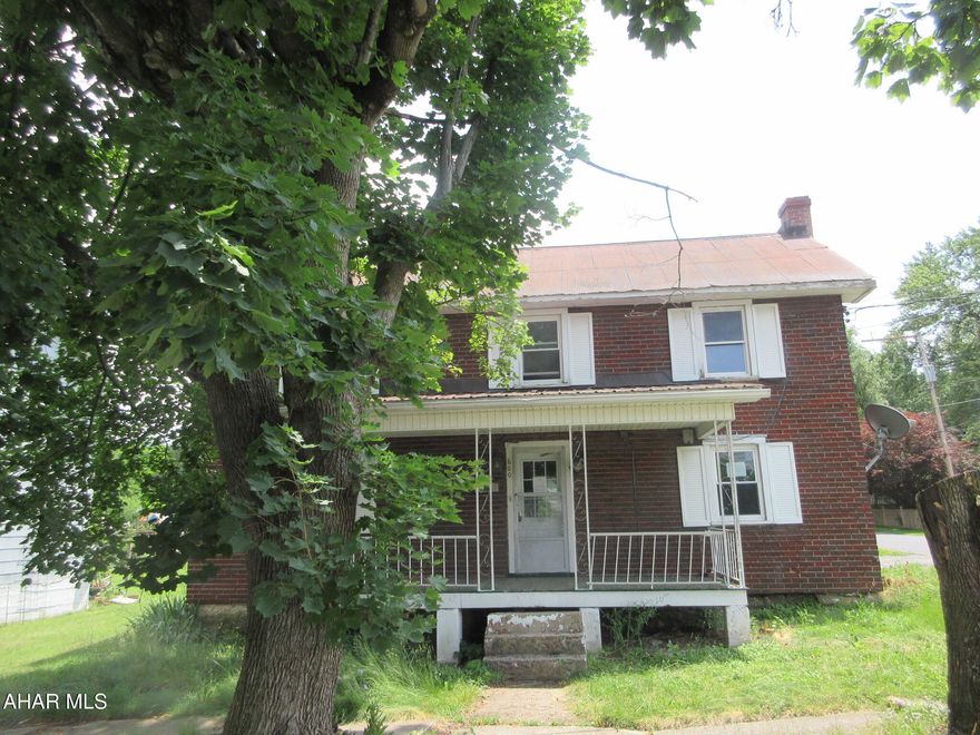 Saxton Borough 2 story home in great location is perfect for investors or handypersons. Large yard,  rear covered patio doubles as carport. Second floor contains 1 bedroom with 2 additional captive rooms that could  serve as additional bedrooms. AS-IS sale, seller will make no repairs.