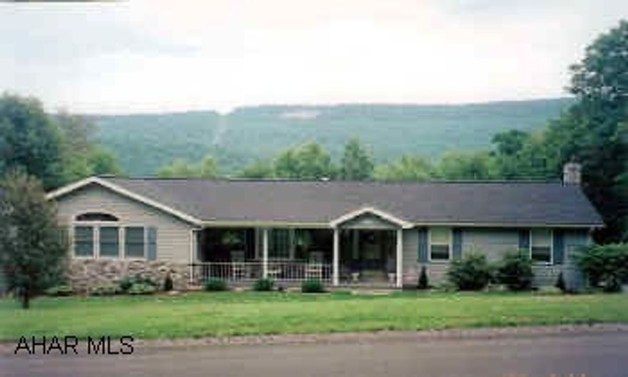 1-Story stone and vinyl home on 1.27 acres. 2 heat sources, electirc baseboard and natural gas.