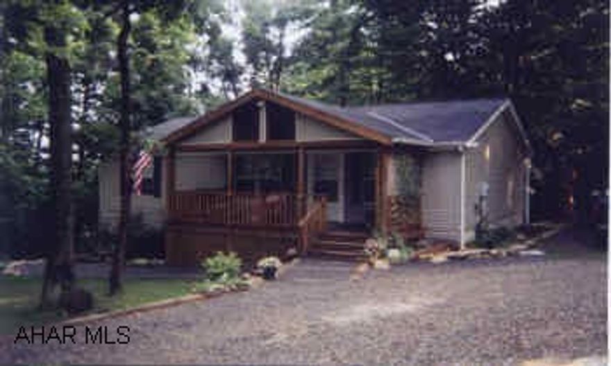 Must see this very nice 28x40 one story home, 3 BR, 2 baths,walk in closet, full basement,  large covered front porch, lg. open deck, patio, pretty with lots of flowers all on a lg. wooded lot.                                                           Must see this very nice 28x40 one story home, 3 bedrooms, 2 baths, walkin closet, full basement,  large covered front porch, lg. open deck, pretty patio,  with lots of flowers,  all on a lg. wooded lot.  Security gate, community center, pool, & tennis courts.  Above Price Gallitzin State Park Lake with 1700 acres of water for great fishing, boating, swimming, & hiking through 6000 acres of forested nature trails. Cambria Co./ Chest Twsp.