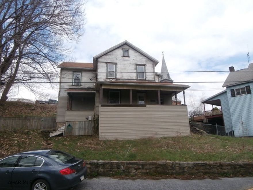 Home needs some TLC. Was remodeled inside but tenants damaged home. Kitchen is modern - re-drywalled interior ect. Great buy for those whom are handy.