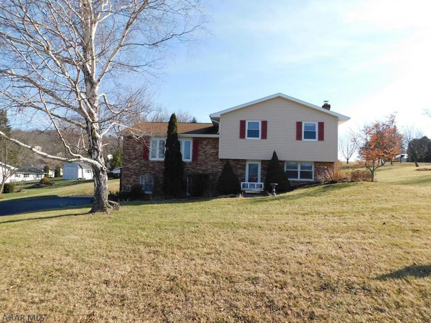 This beautiful home in Rolling Hills is just waiting for you.  Situated on a corner lot, this home is beautifully kept & clean  & maintained.  The updated kitchen features granite counter tops, under the counter lights, and stainless steel appliances.  2 of the 3 bathrooms feature quartz countertops that are breathtaking.  The family room offers additional living space with bonus room perfect for a home office or 4th bedroom.  With a 2 car garage and enclosed sun porch this home has it all!  Contact the Listing Agent for your private tour before this one is gone!