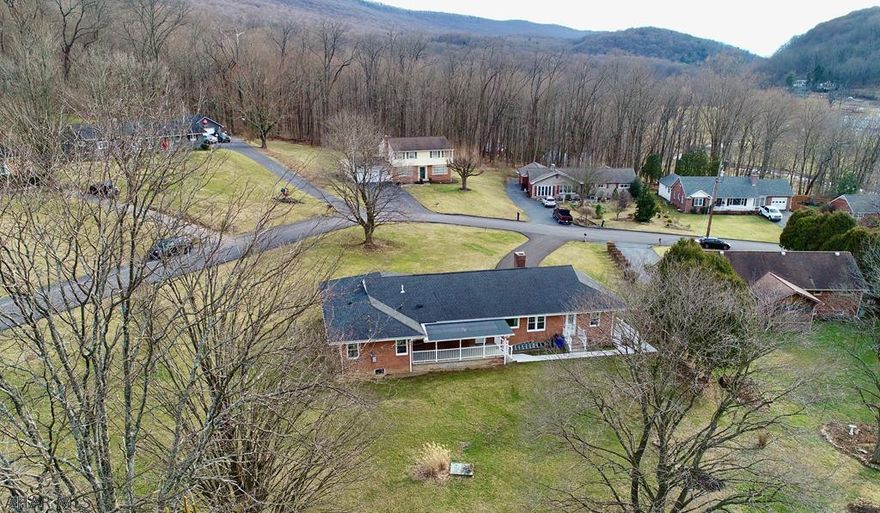 This hard to find 3 bedroom brick rancher, located in Meadowbrook, one of the most desirable neighborhoods in Bedford County is sure to please the most discriminating buyer.   It's close proximity to schools and town makes it an ideal location.  This home will impress with its many upgrades that include new multi zone boiler, new heat pump, new windows and renovated covered porch to name a few.    Spaciousness with tons of natural lights are words that best describe this outstanding home.  An oversized double lot completes this amazing home.