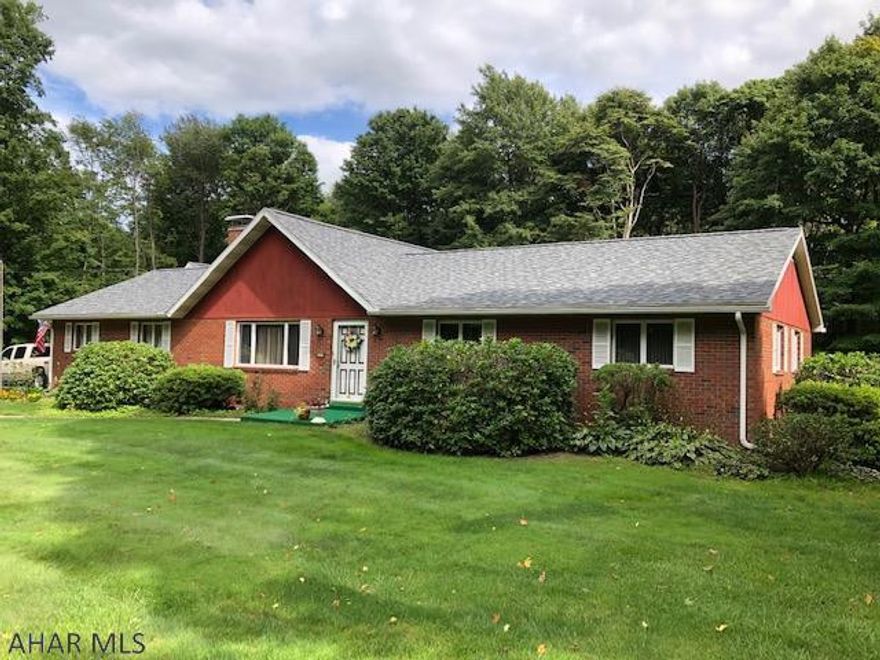 Well built, spacious home with updated kitchen,2 car attached garage and 24'x48' foot detached heated garage with 16' overhead door. Beautiful setting with 3.6 cleared and wooded acres.