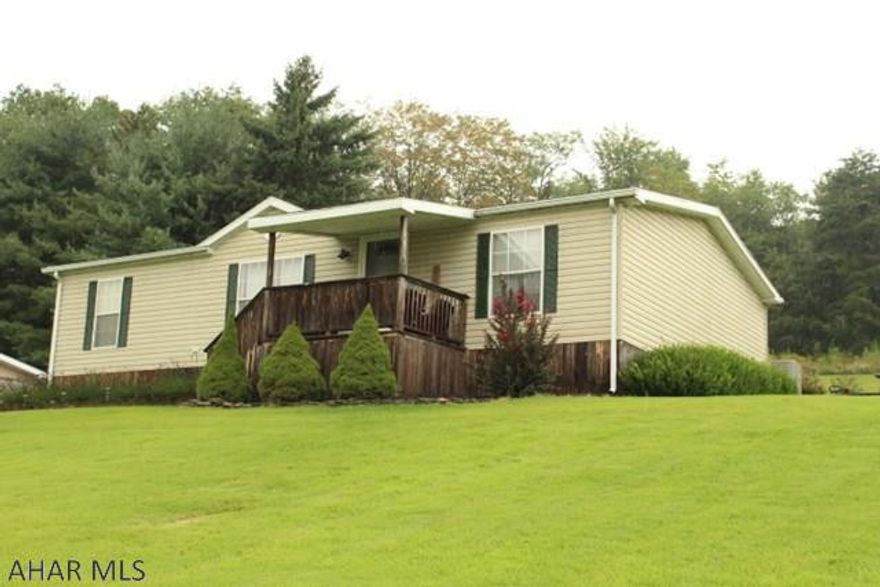 Cozy 3 bedroom, 2 bath home on a little over 2 acres in Chestnut Ridge area.  Lovely views and peaceful setting.  All this home needs is a little TLC to make it your own.