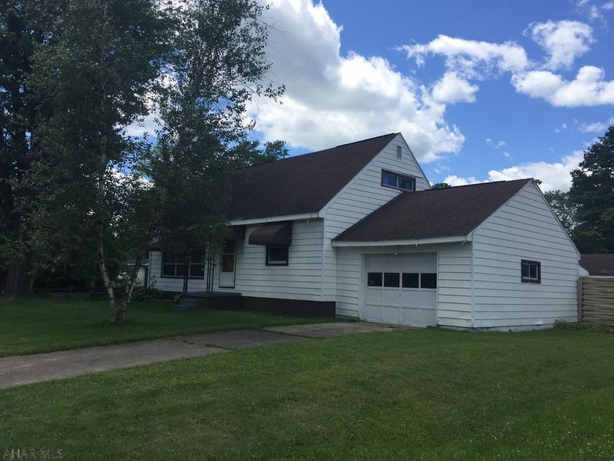 Seller is the listing agent.  Nice home on a corner lot.  Zoned for commercial.  Home interior is somewhat dated but in solid shape.  Large oversize garage in rear.  Private fenced in yard.