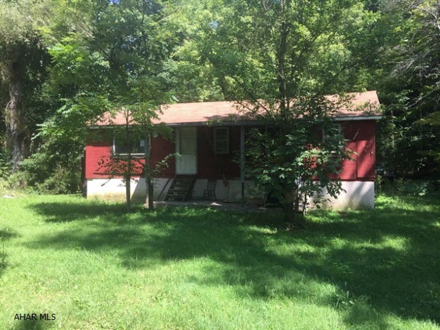 Creek frontage on this camp property.  2 living spaces on the property. With some TLC would make an ideal fishing, hunting, or weekend getaway.  See attachment for PAS requirements and WFHM offer submittal information in MLS document section. This property is now under auction terms. Auction dates are 12/19/2016. Any presale offers should be submitted to Hudson & Marshall by clicking http://www.hudsonandmarshall.com then on the Bid Now icon. Bids will be taken during pre and post sale at the aforementioned website. No minimum starting bid required. Seller has the right (a) to change the date, place, and terms of the sale; (b) to remove the property from the market; and (c) to sell the property prior to the sale. Please contact Listing Agent for details.