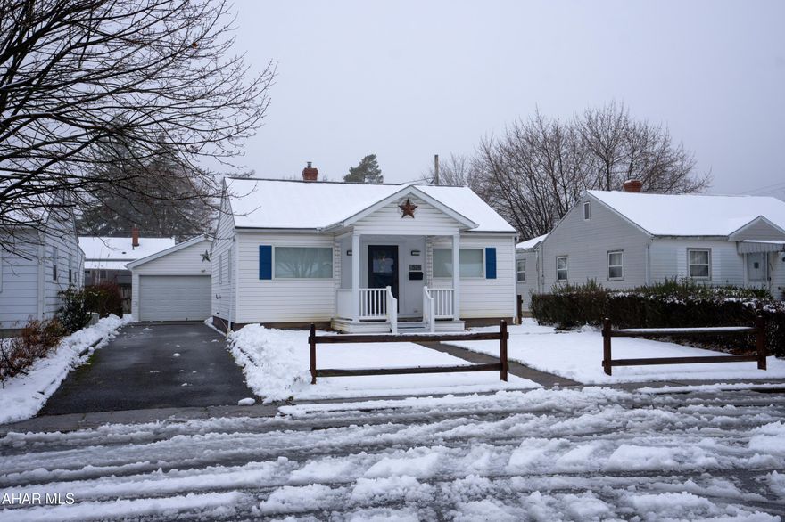 SUPER SWEET SINGLE STORY near the campus!  This 2 BR home (originally 3 & could be converted back) has been lovingly cared for and is now ready for you to move right in. As you step through the front door, you will immediately appreciate the inviting open flow of the living room, dining area, and updated kitchen, creating a perfect space for entertaining family and friends. At the front of the home, you'll discover a spare bedroom, perfect for guests. Tucked away from the hustle and bustle of the main living space, the spacious main bedroom (originally 2 rooms) gives privacy and comfort, complete with multiple closets (one a walk-in) to accommodate all your things. Just a few steps away is the updated bath.  The laundry room is conveniently located on the main level for complete single-story living. The home does have a large full basement-- providing ample storage.  Recent updates include a new HVAC system, with both furnace & central air replaced in 2023. Outside you'll find the oversized garage, which gives not only room for parking your vehicle but also plenty of space for storage and has a workshop area in the back. This home truly checks all the boxes for anyone looking for a cozy, move-in-ready home that combines functionality, and modern conveniences!