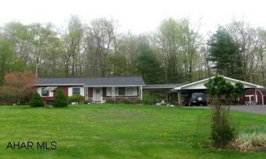 Country living! Well maintained vinyl rancher located on 3+ acres, large wooded area in back with room to grow! Oversized and covered detached carport, above ground pool can stay or owner will remove. Country living! Well maintained vinyl rancher located on 3+ acres, large wooded area in back with room to grow! Oversized and covered detached carport, above ground pool can stay or owner will remove.