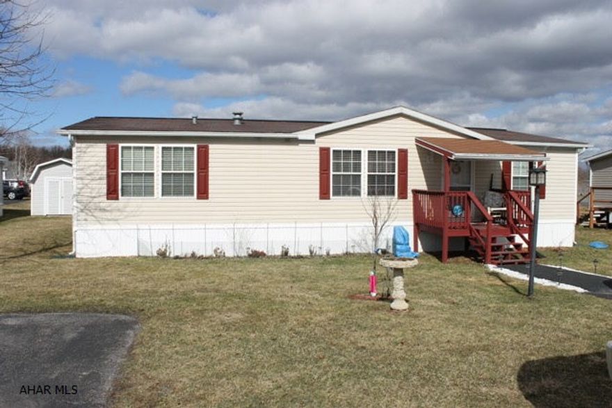 Lovely home with many updates. New carpet in living room, hall and bedrooms. Kitchen has new countertops, glass tile backsplash and new flooring. Gorgeous 12 x 20 sunroom addition with pergo floors, an extra living space to enjoy. Nothing to do except move in.