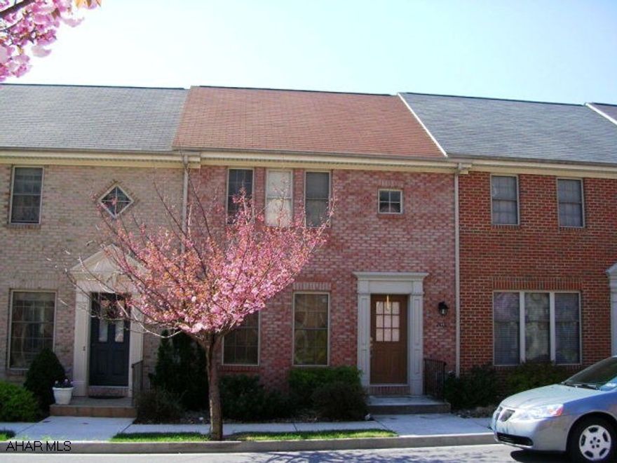 Very nice townhouse in popular Holiday Hills.  Two story brick and vinyl.  Main floor features 1/2 baths, spacious LR/DR with bar/counter seperating the kitchen and dining room.  Second floor features two bedrooms and full bath.  Finished lower level with laundry and walk-out to covered patio.  Spectacular view from second floor deck.  Includes all appliances.  New carpet. GFA/CA.