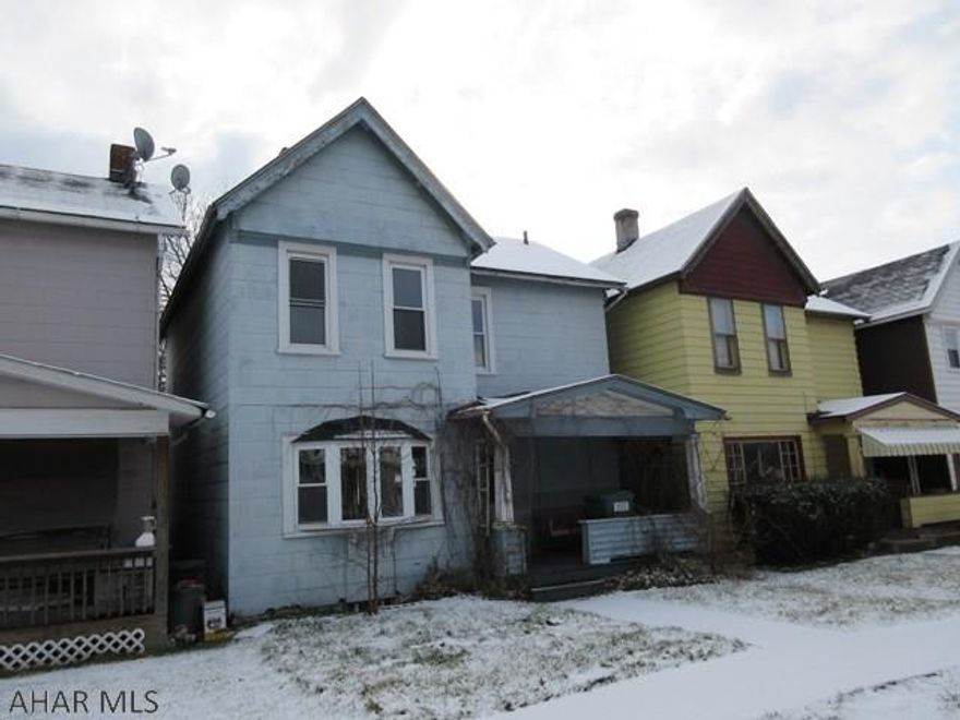 2 Story Juniata home in need of major TLC, but nice area and could be nice with your hard work. 1 car detached garage and nice yard. AS-IS sale.