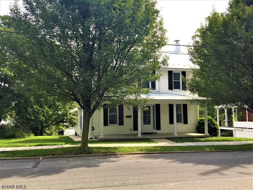 Looking for a Stately Home in the Town of Bedford? Well look no further! Two Story vinyl sided home with newer metal roof, corner lot  complete with rear concrete patio with outside fireplace. Three Bedrooms , 2 and half baths. Central air and heat recently added , zoned for different areas, each individually controlled, has a back up natural gas steam boiler system. Lovely front porch to sit and enjoy life, also nice side sunporch for added enjoyment. One car attached garage.  Walking distance to downtown Bedford, walking trails, recreation,  stores ,restaurants very close by.! Take a look and make this your dream home!