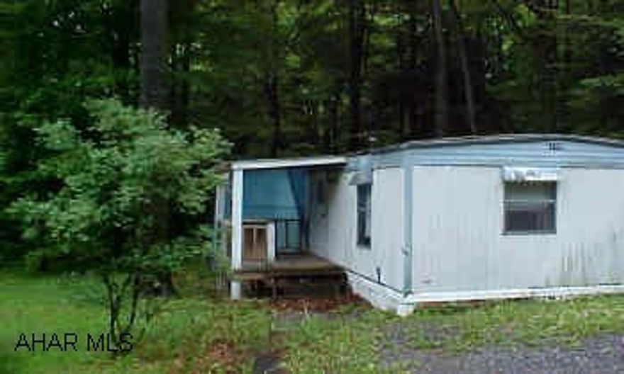 Rt.36N, R at Ashville, L at Sir Barney's Rest. R into Resort, Make R on Harmony- Mobile Home on L. Lot 45/150 x 150/183. Dues Approx. $336/Yr. Glendale Year Round. (Cambria Co.) #J-656 Sold "AS IS". Seller will assist buyer $1,000 at full price contract. Rt.36 Right at Ashville Left at Sir Barney's Resturant Right into Resort,Make Right on Harmony- Mobile Home on Left. Lot size Irreg.45/150 x 150/183. Homers Owners dues Approx $336/Yr.( Assessment $151.30/Quarter)Glendale Year Round. (Cambria Co.) #J-656-Owner: American General Consumer Discount Company. Sold "AS IS". Seller will assist buyer $1,000 at full price contract.