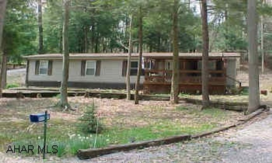 Immaculate home. Family room w/stone fireplace, formal dining room, master bath w/garden tub, central air. Beautiful 6/10 wooded acre. Association fee $327.00 a year.