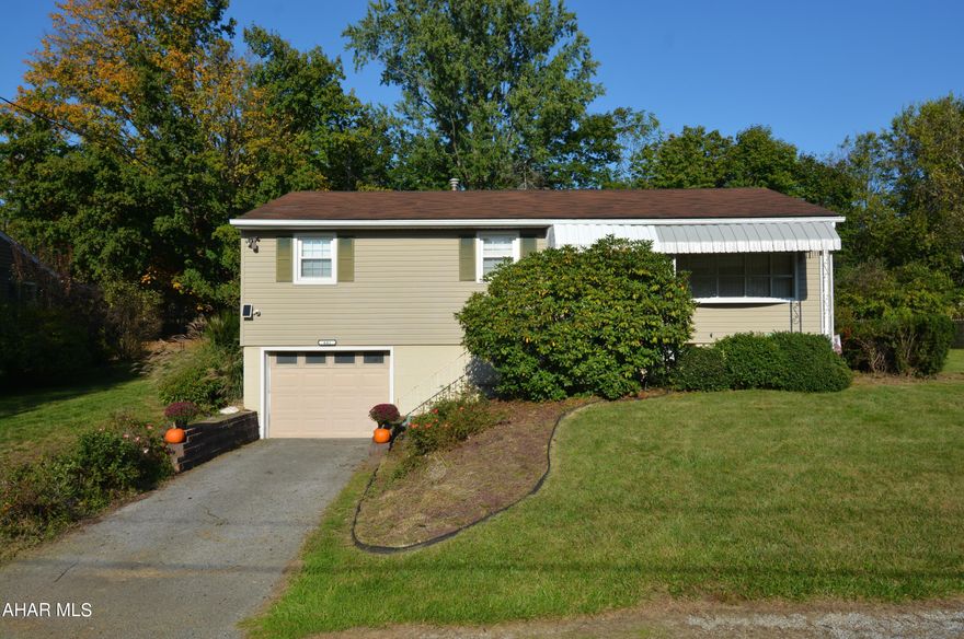 • OPEN HOUSE SAT 11/2, 12:30-2PM • CHERISHED HOME ON CHURCH!  This cute 3 BR | 2 BA home is in a fantastic location just off Brush Mountain Road.  Upon entry you are in the living room which has hardwood floors & lots of natural light soaking in through the bow window.  This area is open to the dining with extra cabinets & counters, & flows right to the updated kitchen.  Just steps off the back of the home is an addition that can function as a family room, or even a bedroom if needed.  It has sliding glass doors to the fenced yard at the side & back.   Back the hall sits a nicely updated main bath, as well as 2 spare bedrooms & the Master Bedroom which has it's own 3/4 bath.  Each of the bedrooms have hardwood floors running throughout them.  In the basement you will find a Family Room with luxury vinyl plank floors, as well as a built in storage/countertop area & a coat closet.  The laundry area has multiple small storage/utility areas off it, as well as a large storage closet with built in shelving & hanging bars which is sure to help you stay organized.  The other thing you will find in the basement is the garage. This home also has central air, a shed for tools/toys & a flat yard for outside enjoyment!