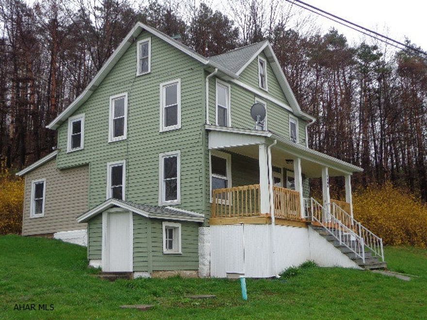 Completely renovated 2-sty home w/2-full baths and 1st floor laundry. Thermo pane windows, oil HW radiant heat, basement w/walk-out, freshly painted throughout and a 1-car detached garage. Includes a 20 x 26 barn and 14 x 40 building on 5.63 Ac.