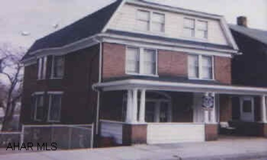 8 room boarding house, 2 baths.