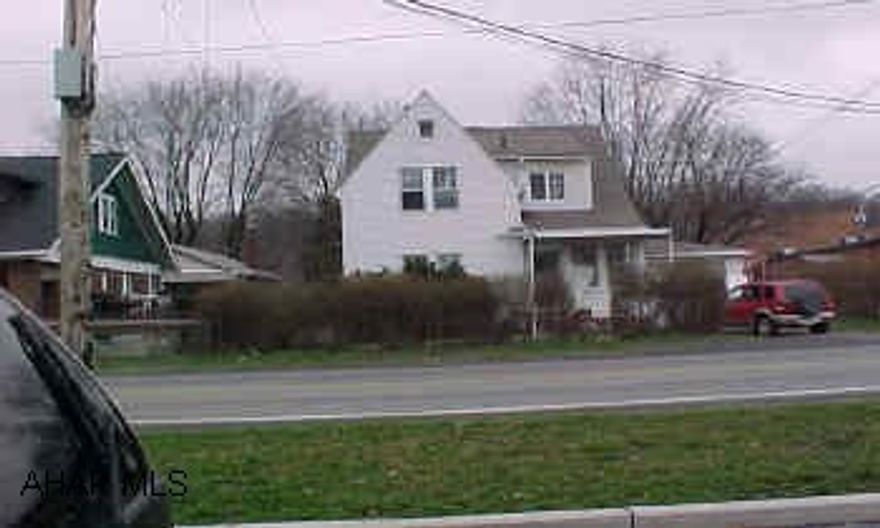 Two story vinyl sided home.  1-car attached garage.  3 Bedrooms.  Property is rented for $400 a month plus all utilities.  Will also sell all houses and back lot in package. Two story vinyl sided home.  1-car attached garage.  3 Bedrooms.  Property is rented for $400 a month plus all utilities.  Will also sell all houses and back lot in package.