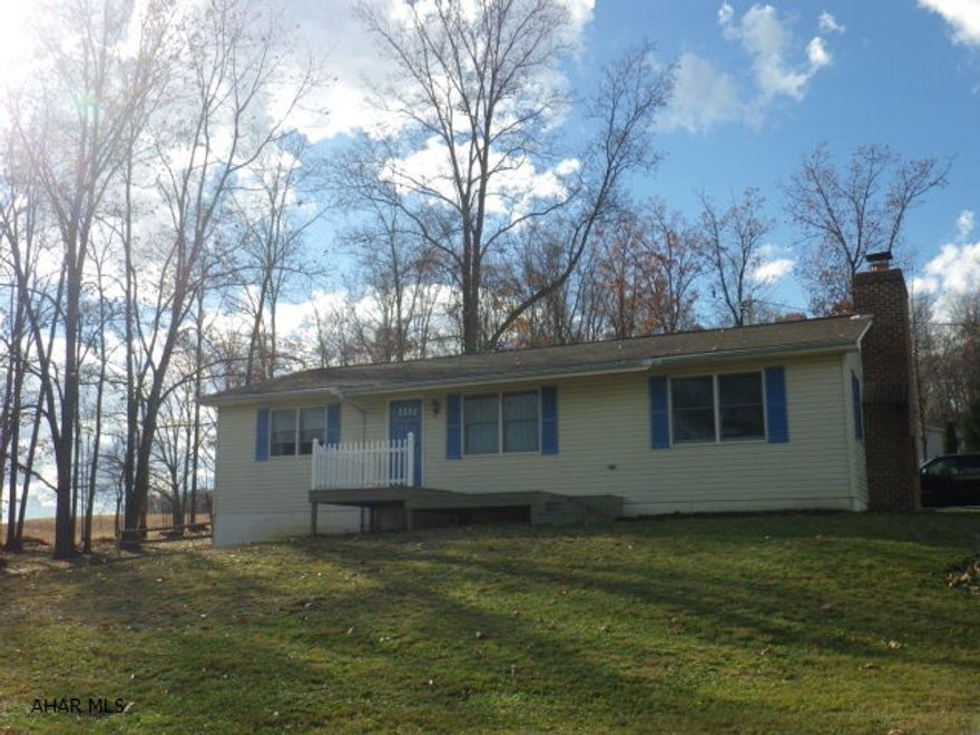 Mint condition 2 BR ranch on over 1 acre in the country. Spacious kitchen, LR & FR. Fireplace, 1 bath, huge BRs. Full basement with wood burner. Could be easily finished. Shed. State game lands right down the road. 1 car garage.