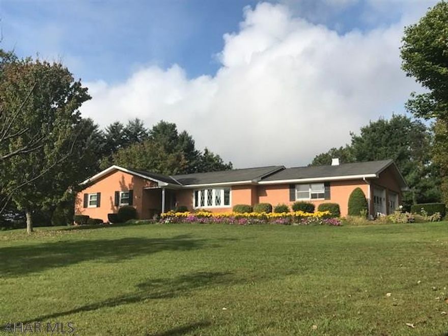 Very desirable brick ranch on 3.45 acres. Beautiful mountain views, park-like setting. Well-maintained with 3 bedrooms, 2 bath, large finishable, walk out basement. Generous sized rooms. Master bedroom has an ensuite bathroom. Covered back patio, detached 1 car garage in addition to a 2 car side entry garage. Storage shed too!