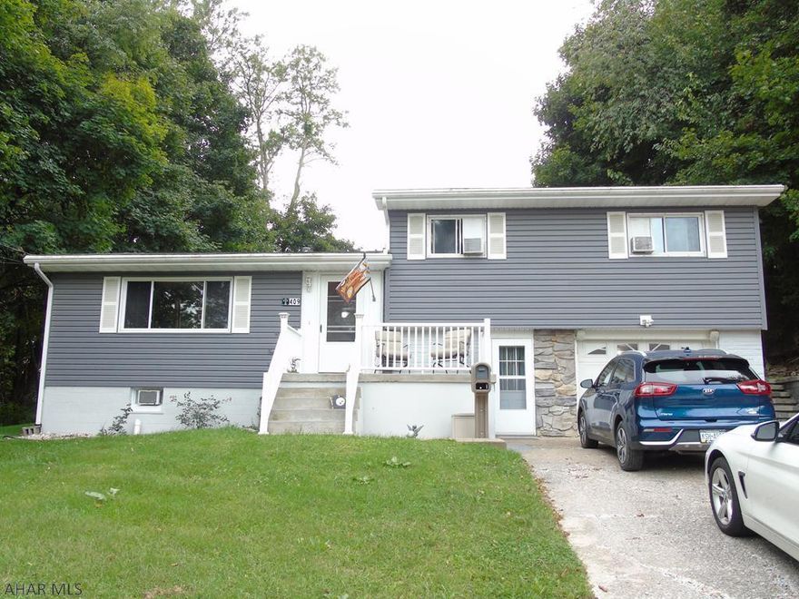 This move in ready, multi-level house, sitting on a large lot in Altoona, would make a great home for entertaining family and friends.  Graze in the updated kitchen, relax in the large finished basement, or enjoy the cool evening air while sitting outside around a fire.  This home also offers a master bedroom with a half bath and two additional bedrooms.  The finished basement has it's own 3/4 bathroom.  Other amenities include keyless entry into the garage, a two story shed, a three seasons room and pantry, newer roof, newer hot water tank, insulated siding, and so much more!  Please see the seller's property disclosure to see all of the updates.  Request your showing today!