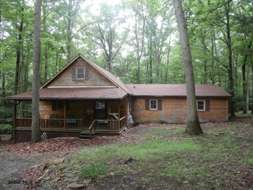 Handiman special. Needs exterior staining and some interior finish. Woodburner in living room.