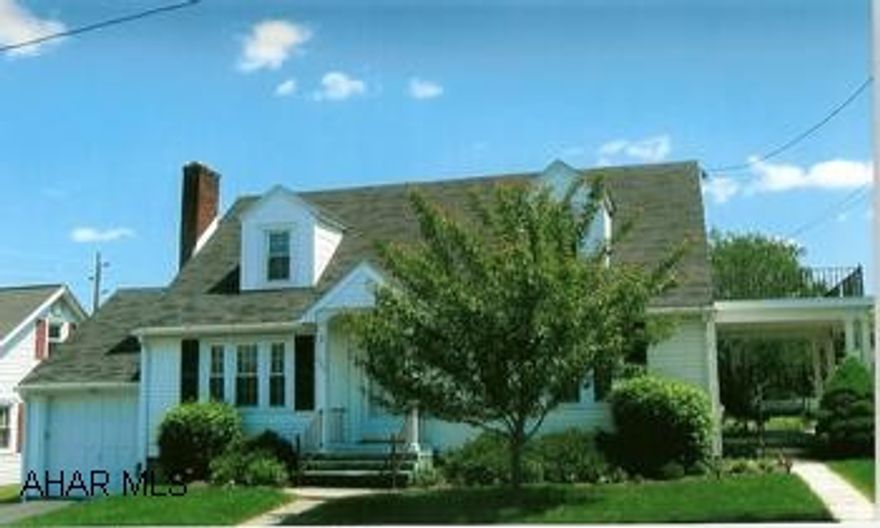 Charming in-town Cape Cod. Cozy Cape Cod with many charming features. Hardwood floors, gas fireplace in living room, dining room, knotty pine kitchen cupboards. Main level bedroom and a full bath. Second floor has two bedrooms and a full bath. Covered porches on front, side and rear. Patio area in the back. Lovely perennial plantings outside and small side yard. New vinyl siding and newly painted interior and new windows. Arched doorways add to the good feel in this home with its in-town convenience.