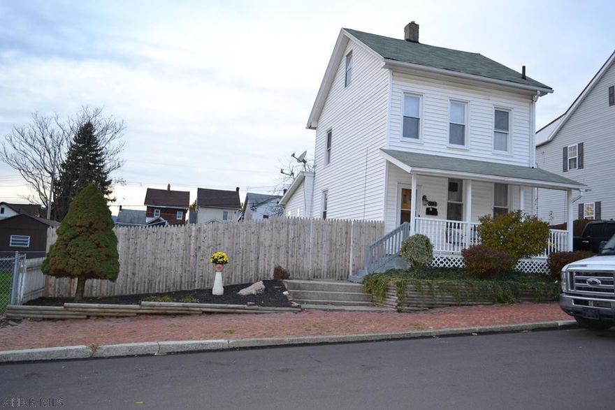 Move in before Christmas!! 122 E. 3rd Ave. Altoona. Look left and right down the street and you can see the care the neighbors take with their homes in this neighborhood. This home is ready to go! 3rd floor could be made into another bedroom.Beautiful wood floors, large oak kitchen, first floor laundry, Remodeled bath, fresh paint and a double fenced lot with off street Macadam parking make this a steal at $82,000 Sellers are Motivated and want it gone before Christmas! So make your offer today!