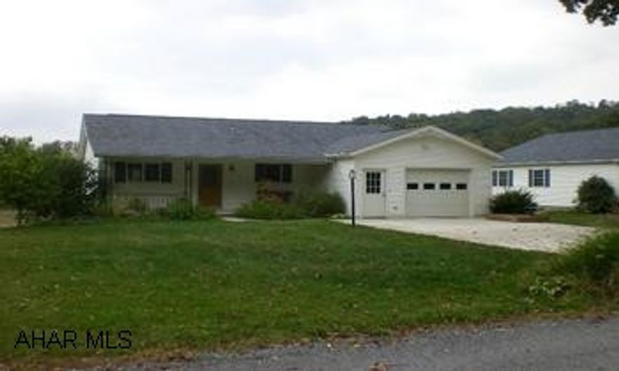 Impressive ranch home in Juniata Mills Subdivision. This newer ranch offers a kitchen w/ cathedral ceiling/oak cabinets, lg LR, MBR w/ walk in closet, MBA, full BA 1st level laundry, finished bsmt w/ lg family room, an add'l BR and another full BA. Impressive ranch home in Juniata Mills Subdivision. This newer ranch offers a kitchen w/ cathedral ceiling & oak cabinets, lg living room, master bedroom w/ walk in closet & master bath, another 1st level bedroom, full bath, 1st level laundry, finished basement w/ lg family room, an add'l bedroom, and another full bath. Basement has ground level walkout doors. Attached one car-finished garage. Heat pump w/ propane back up, central air, Anderson thermo pane windows, front covered porch and rear deck.