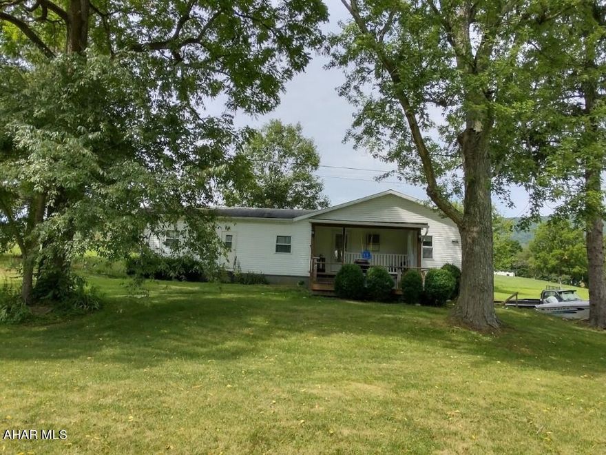 Looking for a weekend getaway - or full-time home -check this property out. Property is minutes away from Raystown Resort, Tatman Run boat launch and Trough Creek State Park.   Rural setting - Could be used for an Airbnb rental. Enjoy the outdoors sitting on the front porch - build a fire pit, room to store your boat.