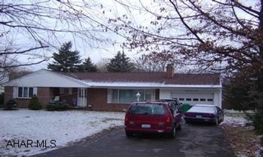 4 Bedroom 2 Bath Ranch on .7 acres.  Logan Township.