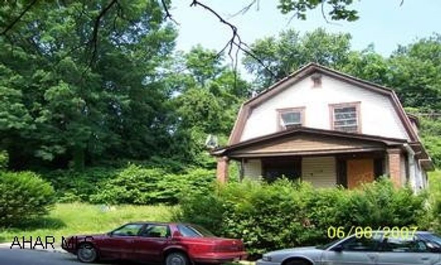 2 story that needs some work - nice lot! Home has potential with some work. Super nice lot.