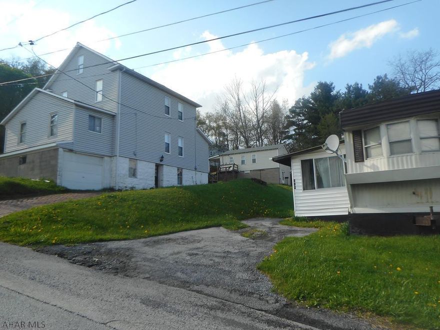 Investment opportunity!  Great price for the income it produces!  Includes 506 6th Ave, 516 Russell Ave (mobile home lot rental) 518 and 520 Russell Ave.  3 currently rented out, and the other is a blank slate that can be fixed up to be rented out or owner occupied