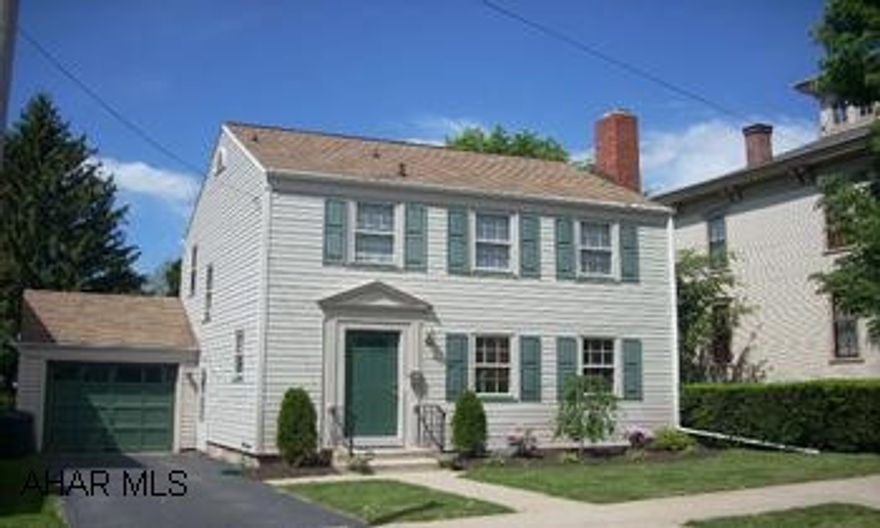 Absolutely charming 2 story home with new maple kitchen and baths. Lovely hardwood floors, brick fireplace in living room, built in corner cupboard in dining room. 1 car garage. Move in condition. Call Nicci @ 934-1819. Realtor owned.