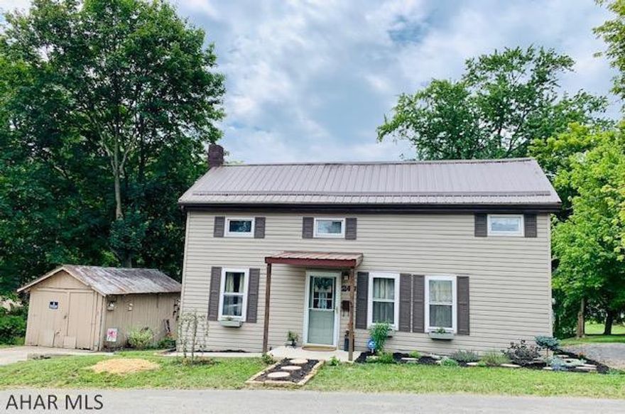 Charming and  beautifuly updated home in the Borough of Bedford! Open concept is offered though the kitchen and living area with the added spiral staircase that leads up to the upstairs. The amish made bar features 4 stools for added convenience, and plenty of room for a dining table. New stainless steel appliances,new bathrooms and recess lighting. Master suite has a  walk-in closet, laundry room, master bath and bonus room w/closet and sitting room. The 2nd floor can be 1-2 bedrooms, office, walk-in closet and a 1/2 bath.  The lovely in-ground pool w/ screened-in pavillion, electric a new privacy fence surrounding the pool area to enjoy with your family. A garden shed storage for maintaining the yard. Nicely landscaped  MOVE-READY!!  Home has natural gas service but not converted.